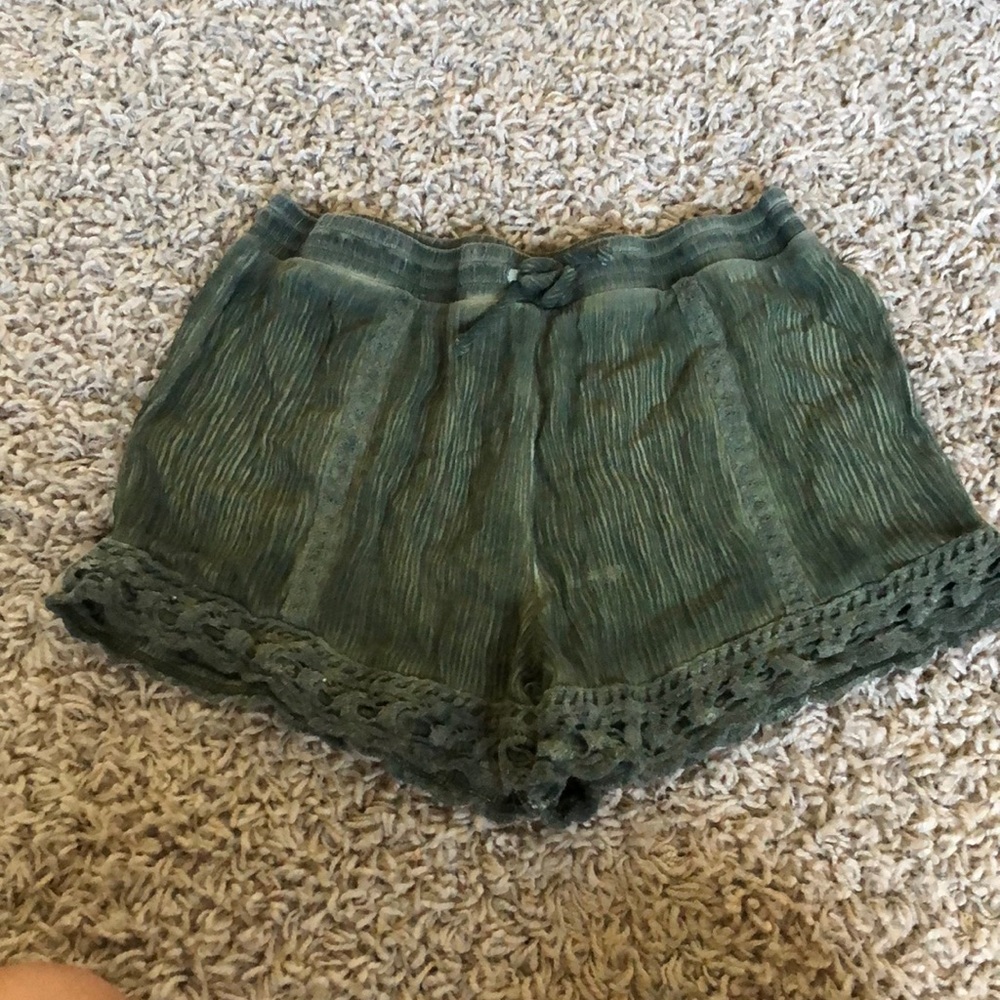 army green shorts with detailing